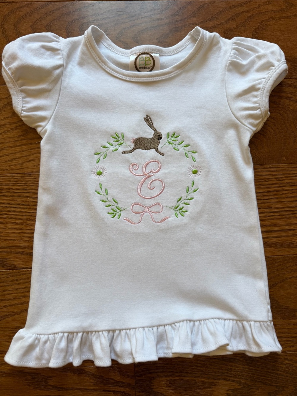 White Ruffle Hem Tee with Bunny and Letter ‘E’ Monogram